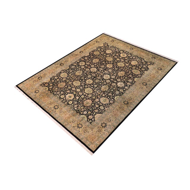 Designed with mesmerizing intricacy and gorgeous color palette, this hand-knotted masterpiece demonstrates the beauty and...