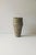 In Bloom IV Ceramic Vase by Antonia Maria One of a Kind. Dimensions: Ø 18 x H 37 cm. Materials: Ceramic, grey clay,...