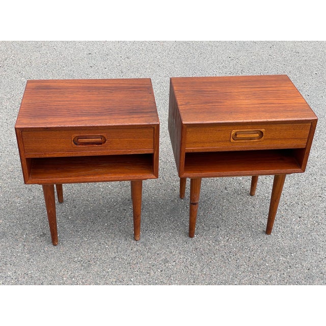 The allure of Mid-Century modern design with the pair of Johannes Andersen nightstands for Dyrlund. Handcrafted from...