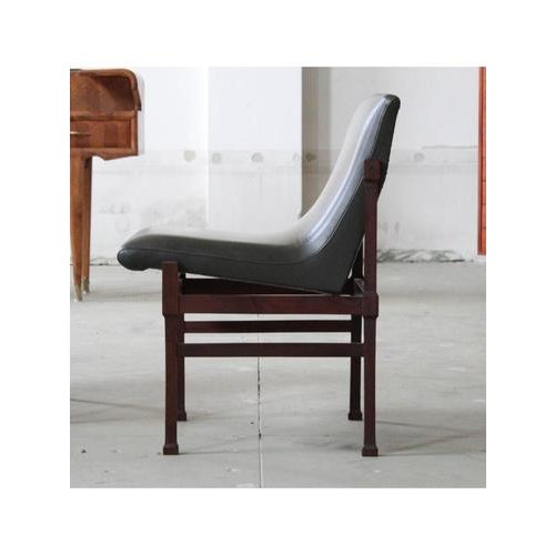 Type Armchairs (pair) Date 1950-59 Style Scandinavian Origin Italy Materials Skai, Wood Width 50 cm Depth 60 cm Height 75...