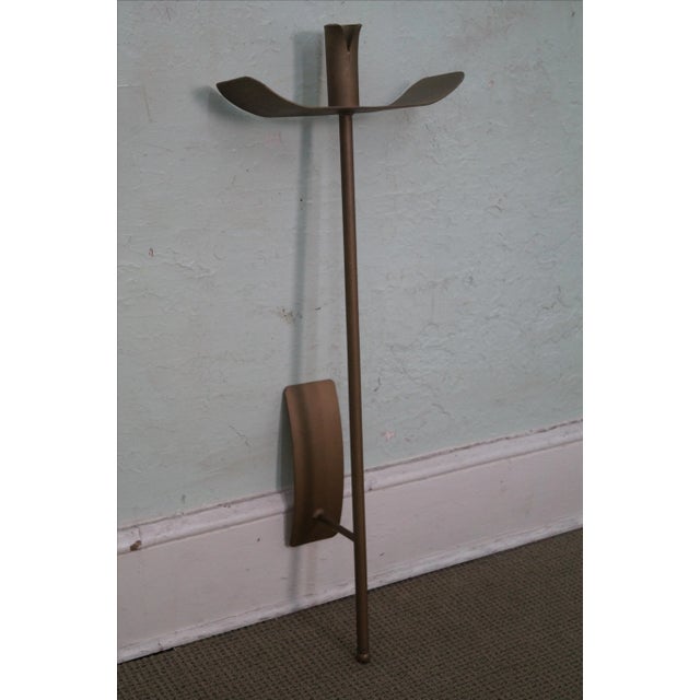 Mid Century Tommi Parzinger era gold painted iron wall sconce. High quality, custom made, iron, wall candle sconce in a...