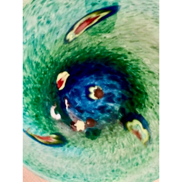 This is a magnificent piece of Murano artisanship. Its size gives it gravitas, and its myriad colors are truly a testament...