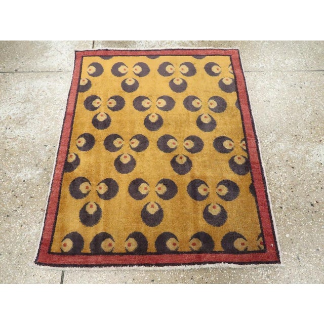 A vintage Turkish Anatolian Deco throw rug handmade during the Mid-20th century. Measures: 2' 7" x 3' 2"