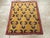 A vintage Turkish Anatolian Deco throw rug handmade during the Mid-20th century. Measures: 2' 7" x 3' 2"