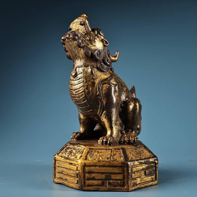 Impressive heavy solid bronze seated Pi Yao, the mythical Chinese fortune guardian beast, with ornate curled mane and...