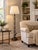 Elegant in its simplicity, this forged iron floor lamp showcases a distinctive off-center ring motif that lends an...