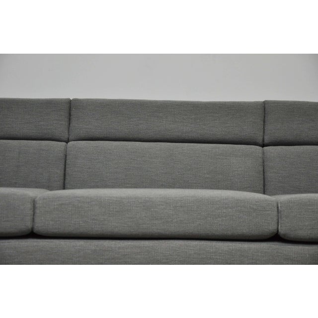 Channel sofa model 7140 designed by Roger Sprunger for Dunbar. Fully restored with new textured grey fabric.