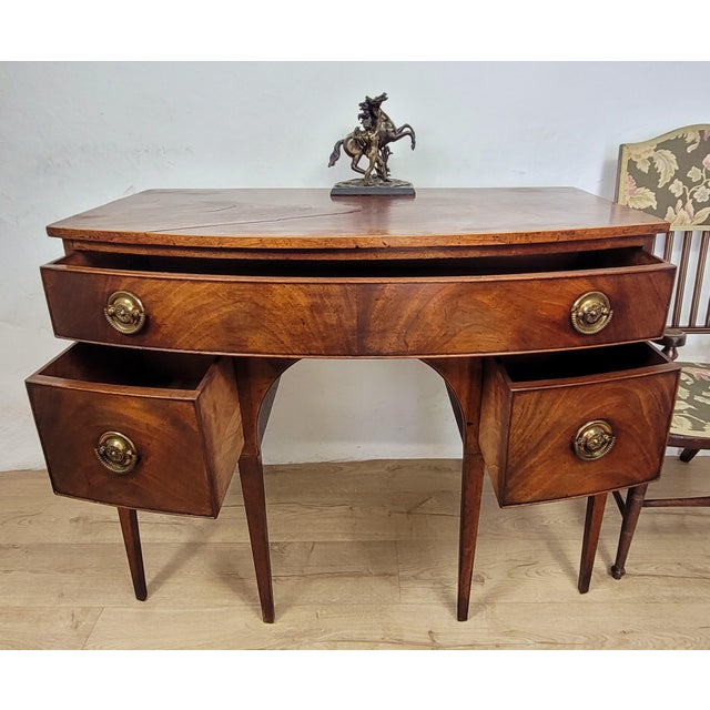 This is a gorgeous Regency Bowfronted Sideboard with many timeless period qualities. Circa 1800. Displaying a wonderful...