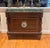 An exceptional antique Louis XVI style marble top cabinet beautifully crafted from solid and burled oak, adorned with...