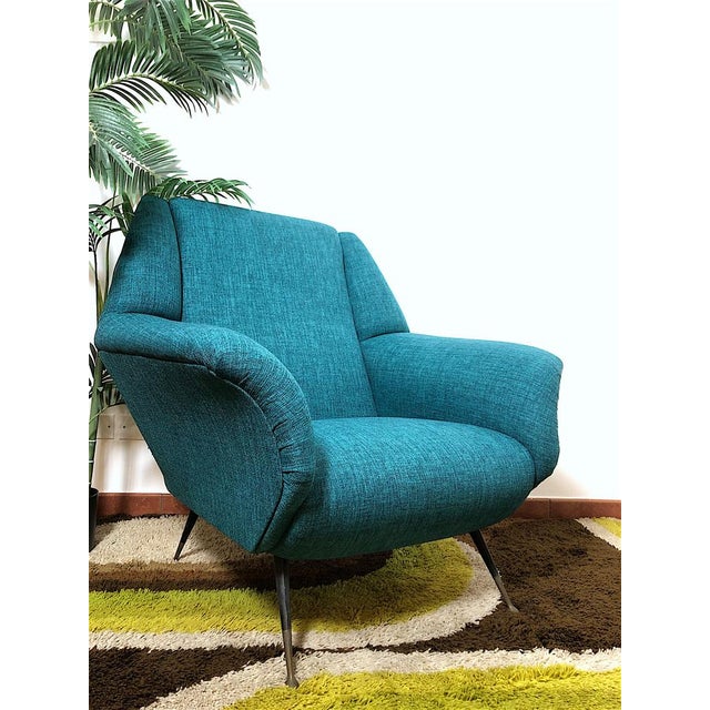 Vintage 60s armchair designed by Gigi Radice. The armchair is of Italian manufacture produced by Figli di Renzo Minotti,...
