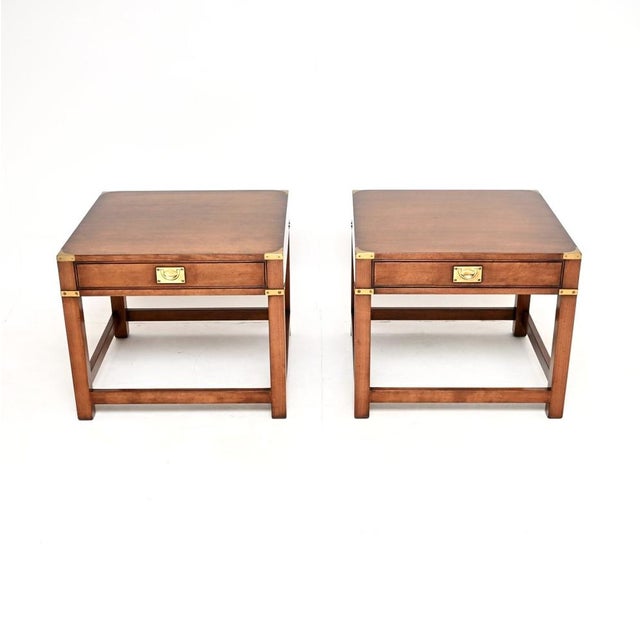 An impressive and large pair of antique military campaign style side tables. They were made in England, and they date from...
