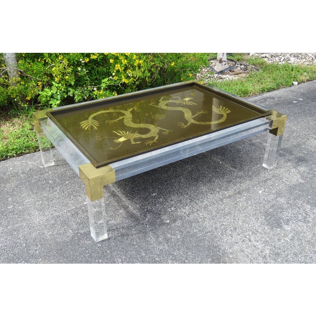 Mid Century Modern Lucite And Brass Glass Top Painted Dragon Coffee Table Chairish This awesome table features a mythical dragon with a glass table top.