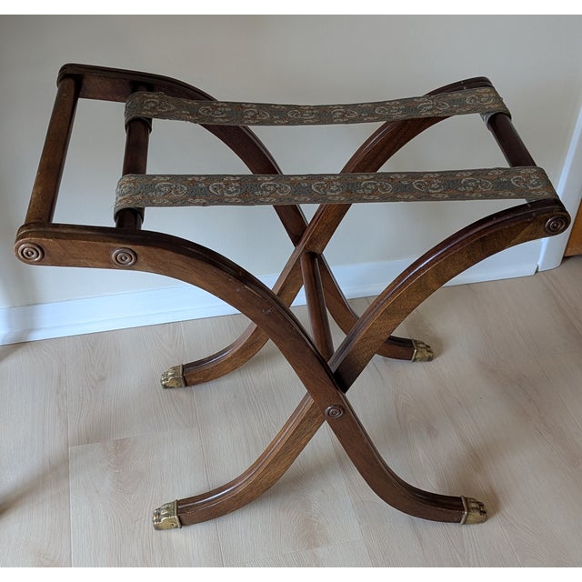 Vintage mid-20th-century mahogany luggage rack. All components are original, including the straps and feet, preserving its...