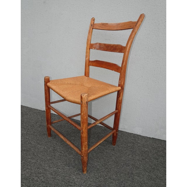 Gorgeous Chair in Good Vintage Condition. Solid and Firm. The seat has been re-rushed. Please note: The wood cross bar on...