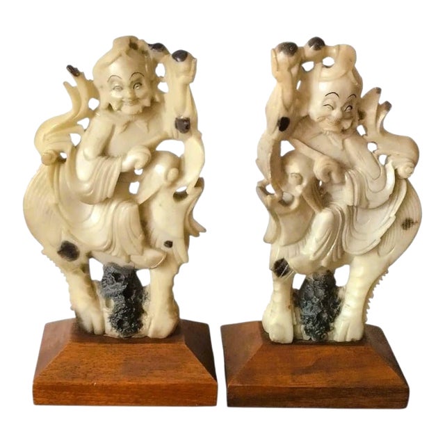 Pair of 19th Century Carved Stone Qilin Rider Sculptures on Wooden Bases. For Sale