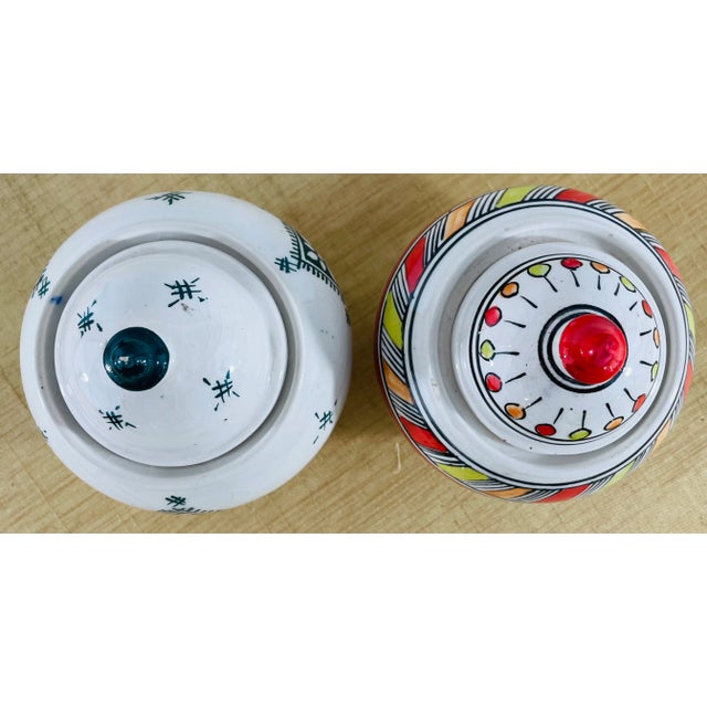 With exotic Berber-inspired motifs painted in a vibrant array of color, these wonderfully handcrafted sugar bowls make a...
