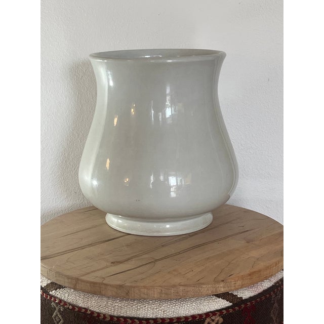 What was once used for necessities may now be used as a piece for flowers or just as a standalone vase. The ironstone...