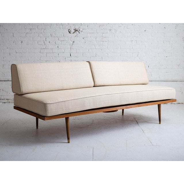Mid-Century daybed styled after George Nelson. Solid wood frame, cushions newly upholstered in cream slub silk with...