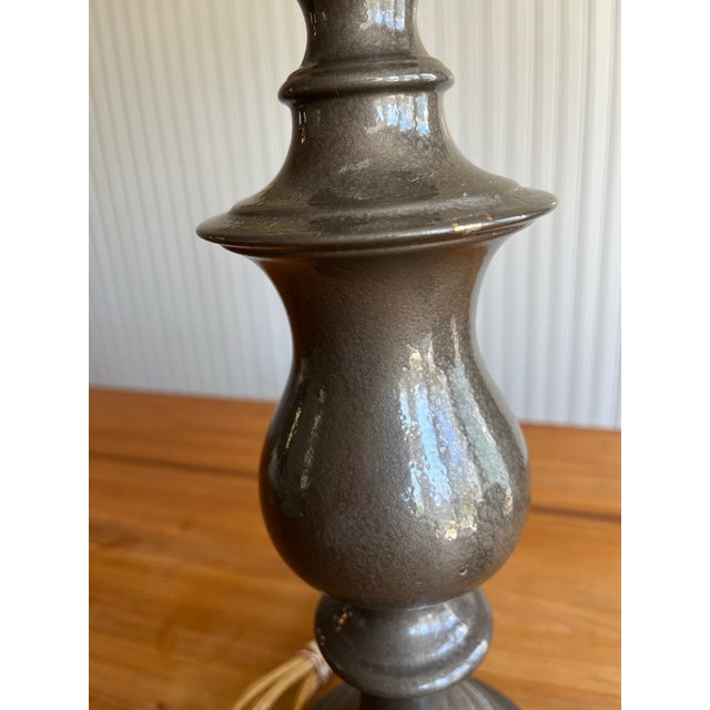 Hollywood Regency style vintage HEAVY brass lamp covered in an enamel- style charcoal gray paint. Likely from the 1960’s....