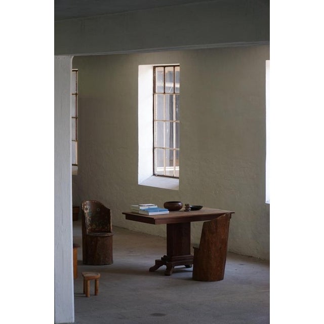 Elegant Danish pedestal table / dining table / desk crafted in solid oak, featuring a rectangular top supported by a...