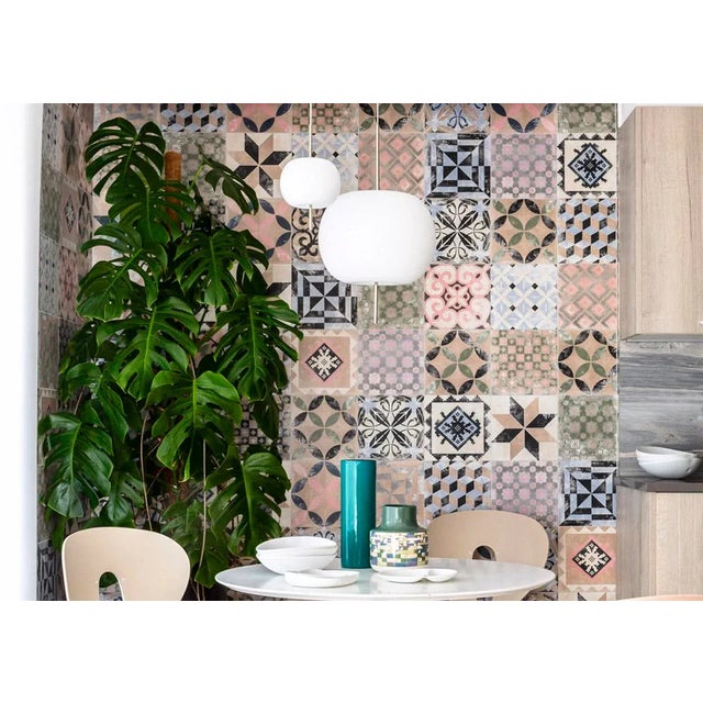 Small 'Kushi' opaline glass and brass suspension lamp for KDLN. Executed in mouth-blown double layer opaline glass pierced...