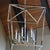 Classic large proportions to the modern geometric structured chandelier - Open steel framework with slightly offset...