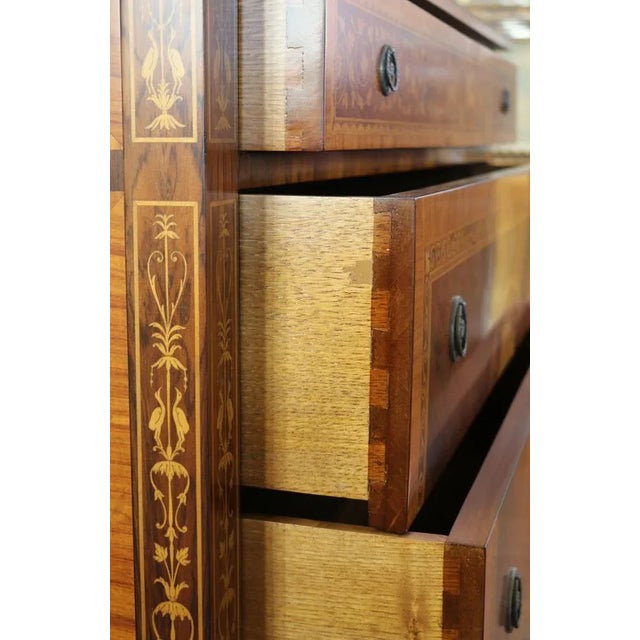 Dresser made in the 90s of the last century with inlays in neoclassical style, in fruit wood and polychrome woods. Natural...