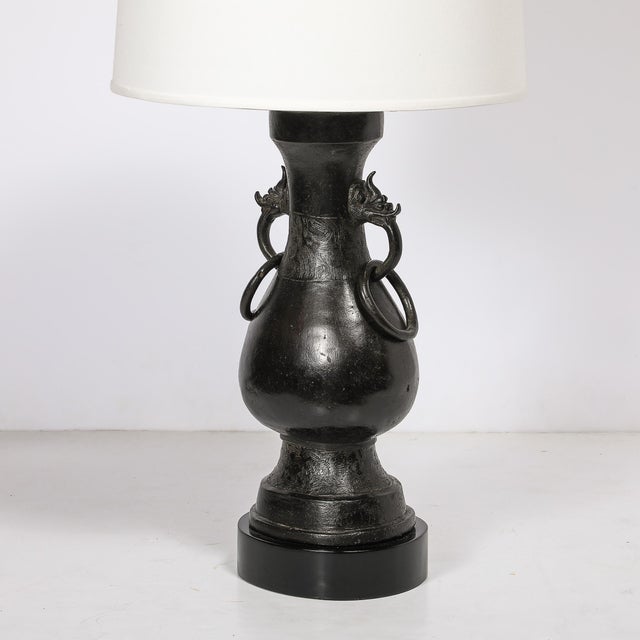 This striking pair of mid-century modernist iron dragon amphora table lamps is a bold blend of Chinoiserie design and...