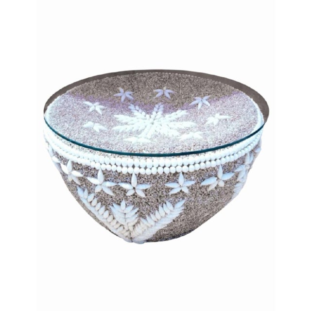 An incredible custom made rare or even one of a kind seashell encrusted round coffee table The entire table is covered in...
