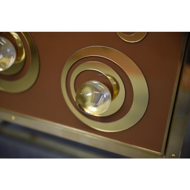 We present a stunning pair of handcrafted bedside tables that fuse the beauty of Murano glass and brass with modern...