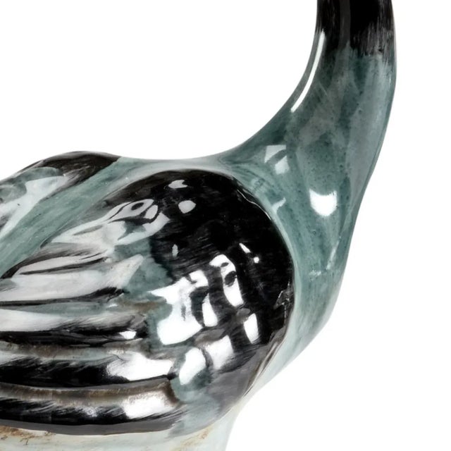 Wonderful hand painted pair of sculpted water fowl. Hand painted. Designed by Claire Bell.