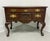 A Philadelphia lowboy chest in the Queen Anne style by Henkel Harris, of Winchester, Virginia, USA. Solid mahogany, brass...