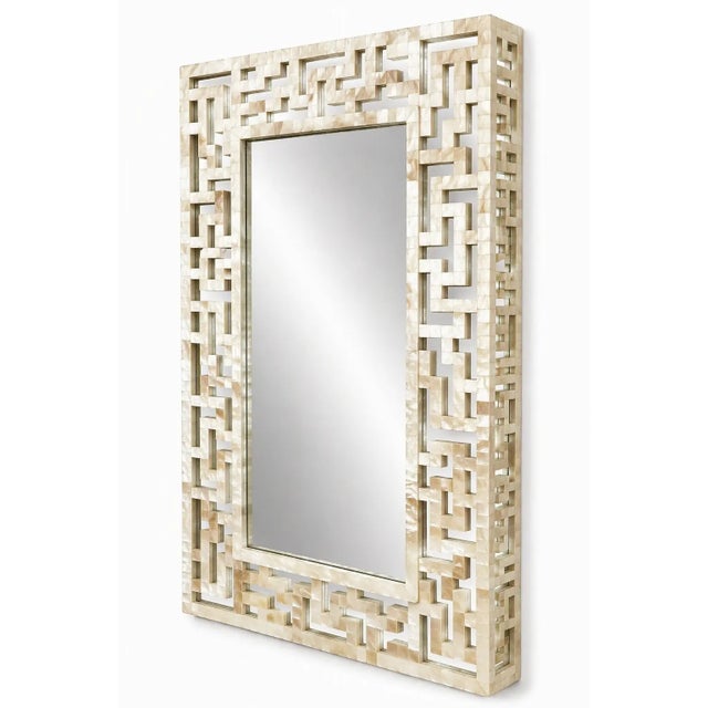 This Neiman Marcus Capiz Shell Mirror is a high-end, handcrafted piece, sourced through the luxury retailer's imported...