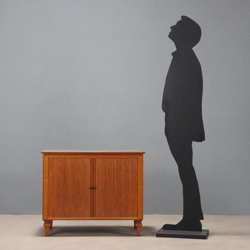 Teak veneered sideboard with shutter doors and a fingerboard. It has some small areas requiring restoration on the sides....