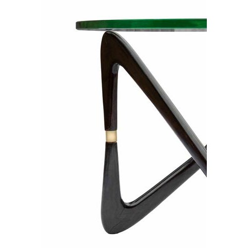 Vintage Moebius Coffee Table is an original design furniture realized in the mid-20th century. Wood, Brass and Glass....