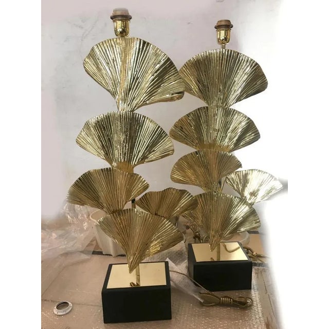 Gold brass frame leaves of ginko biloba table lamp brass elements striped by handand . Fruit of high italian...