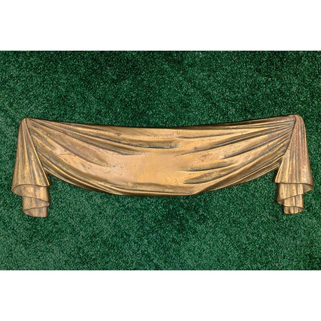 This Heavy, Solid Brass Swag Pediment Piece looks to have come off of a Mirror or a Fireplace Mantle Measures 22.25"...