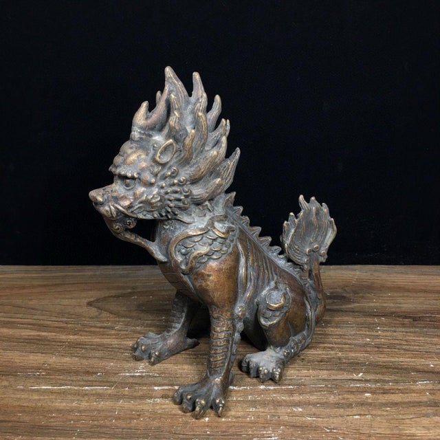 This impressive sculpture depicts a Qilin (or Pixiu), a mythical hooved creature from Chinese mythology. The beast is...