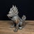 This impressive sculpture depicts a Qilin (or Pixiu), a mythical hooved creature from Chinese mythology. The beast is...