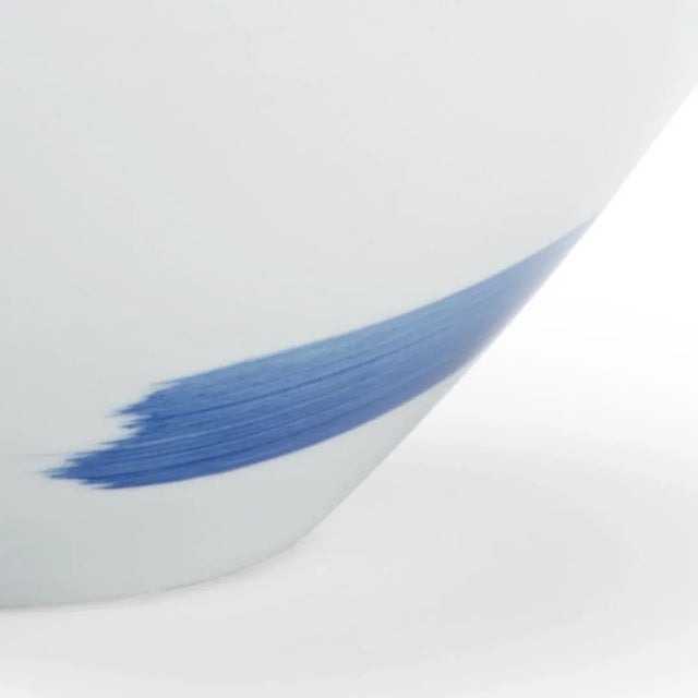 Cobalt blue and white glazed porcelain. Hand painted.