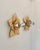 Pair of wall sconces with a beige painted metal frame, produced in France in the 1970s. Classic design inspired by a...