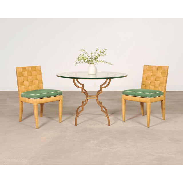 Rare set of four "Block Island" rattan cane rush dining chairs designed by John Hutton and produced by Bielecky Brothers...