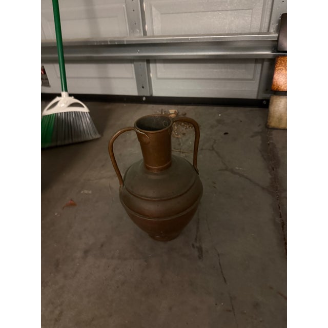 Antique copper pot with handles