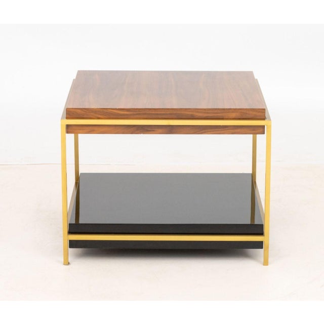 Mid-Century Modern Style Brass Two-Tier Side Table, the brass frame with mahogany top above black lacquered undertier....