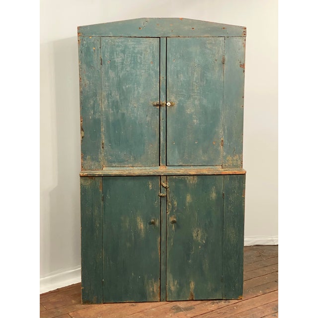 A fine hand made 19th Century painted country pine step back cupboard. The shelves are fixed in place and not adjustable....