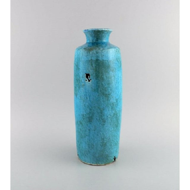 European studio ceramist. Large unique vase in glazed stoneware. Beautiful glaze in turquoise shades. 1970/80s. Measures:...