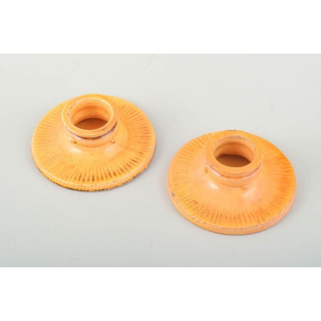 Svend hammershøi for kähler, denmark. A pair of ceramic candlesticks, ca. 1930s. Two low, round ceramic candlesticks with...