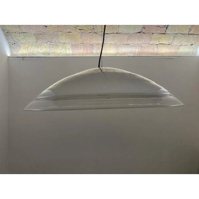 Murano glass suspension lamp produced by I3 in the 70s. Of a beautiful often and solid glass, with an almost water...