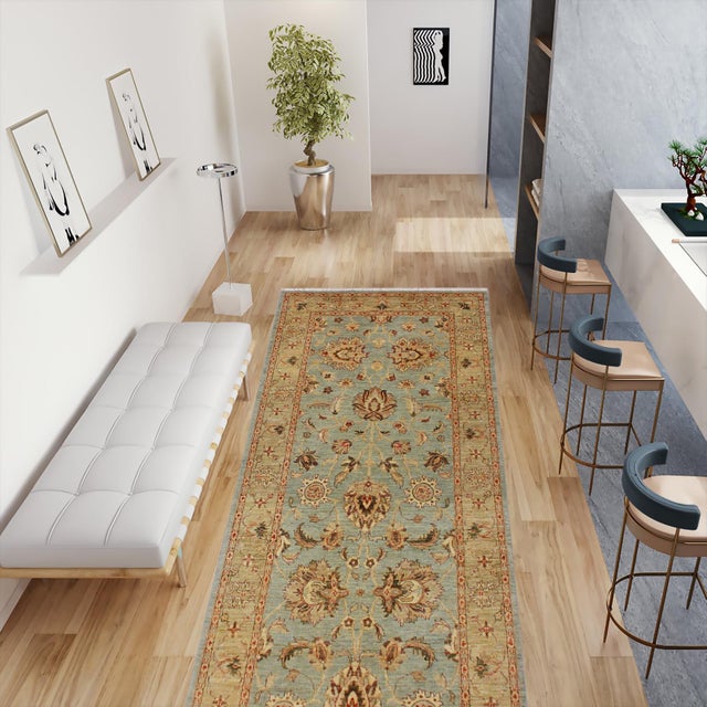 Enhance the ambiance of your home with this magnificent Persian-influenced Turkish hand-knotted rug made by skilled...