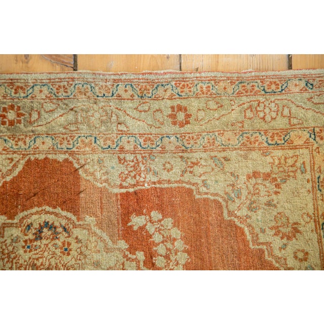 :: Intricate antique rug mat circa 1910 with ornate center medallion. Colors in this rug include shades of gold, bronze,...
